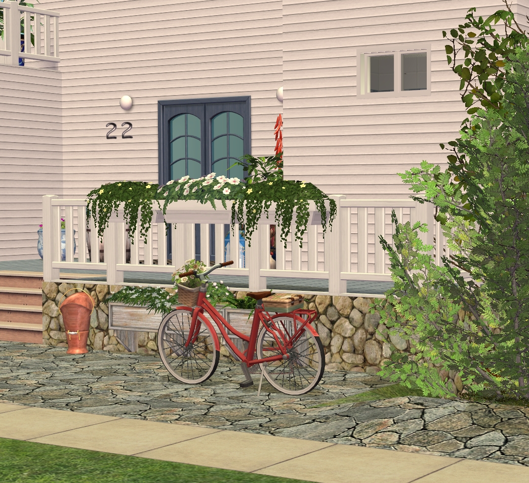 Biała Sadyba — rower przed domem.jpg